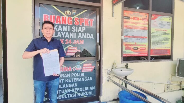 Samsurijal Labatjo usai melapor di Polresta Palu, Rabu (5/11). (Foto: ist)